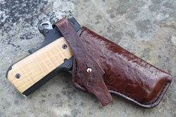 Field Holster with sourwood texture added to the holster and strap.  The strap end is shaped like tree bark.